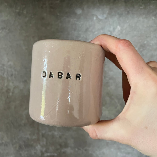 Pale pink ceramic mug "DABAR IR ČIA"