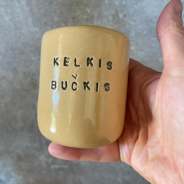 Geltonas puodelis KELKIS BUČKIS