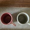 A pair of big ceramic mugs for work and fun