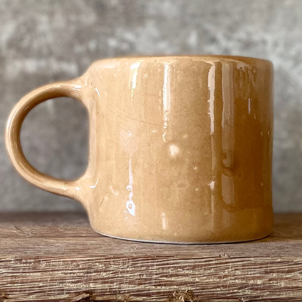 Brownish mug with good wishes