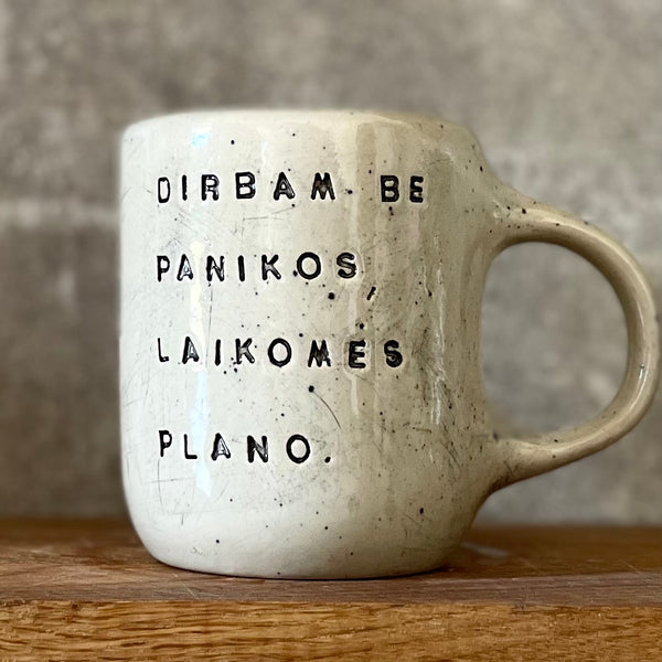 Speckled mug with words about work - another