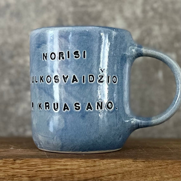 Blue bigger mug with funny phrase in Lithuanian
