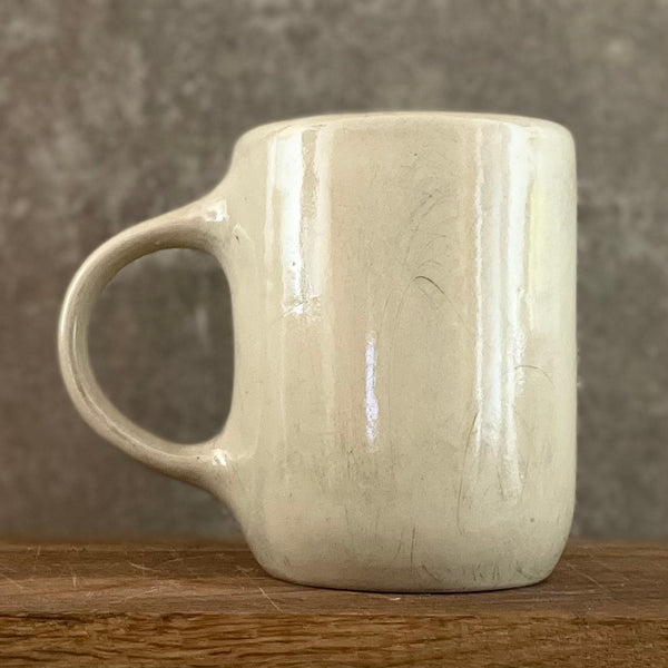 White big ceramic mug with words about work