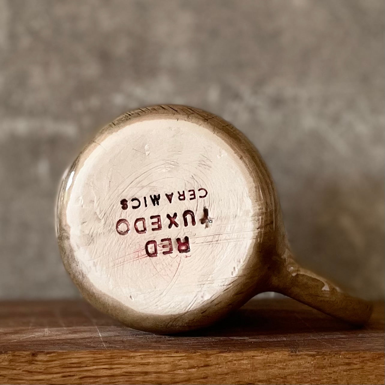 Dark brown tumbler mug with words about work