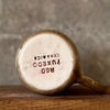 Dark brown tumbler mug with words about work