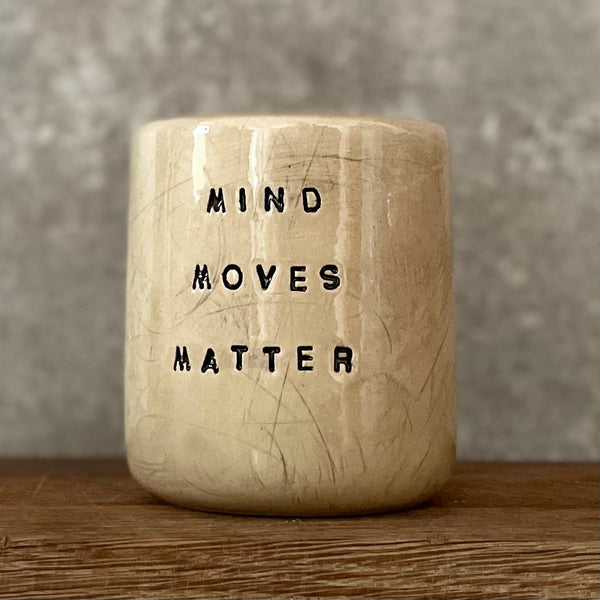 Beige mug with quote by Vergil