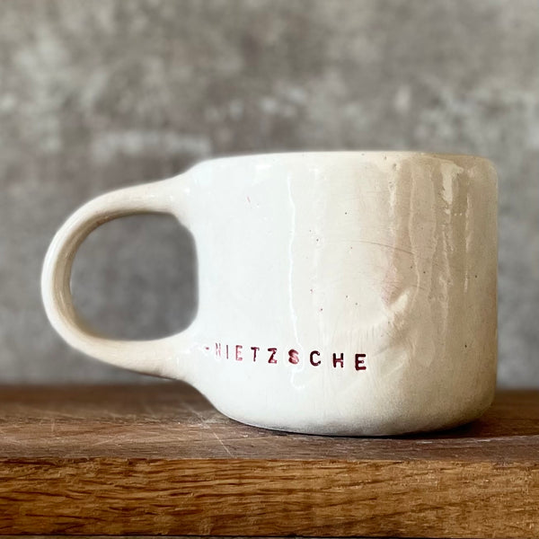 Mug with quote about artists