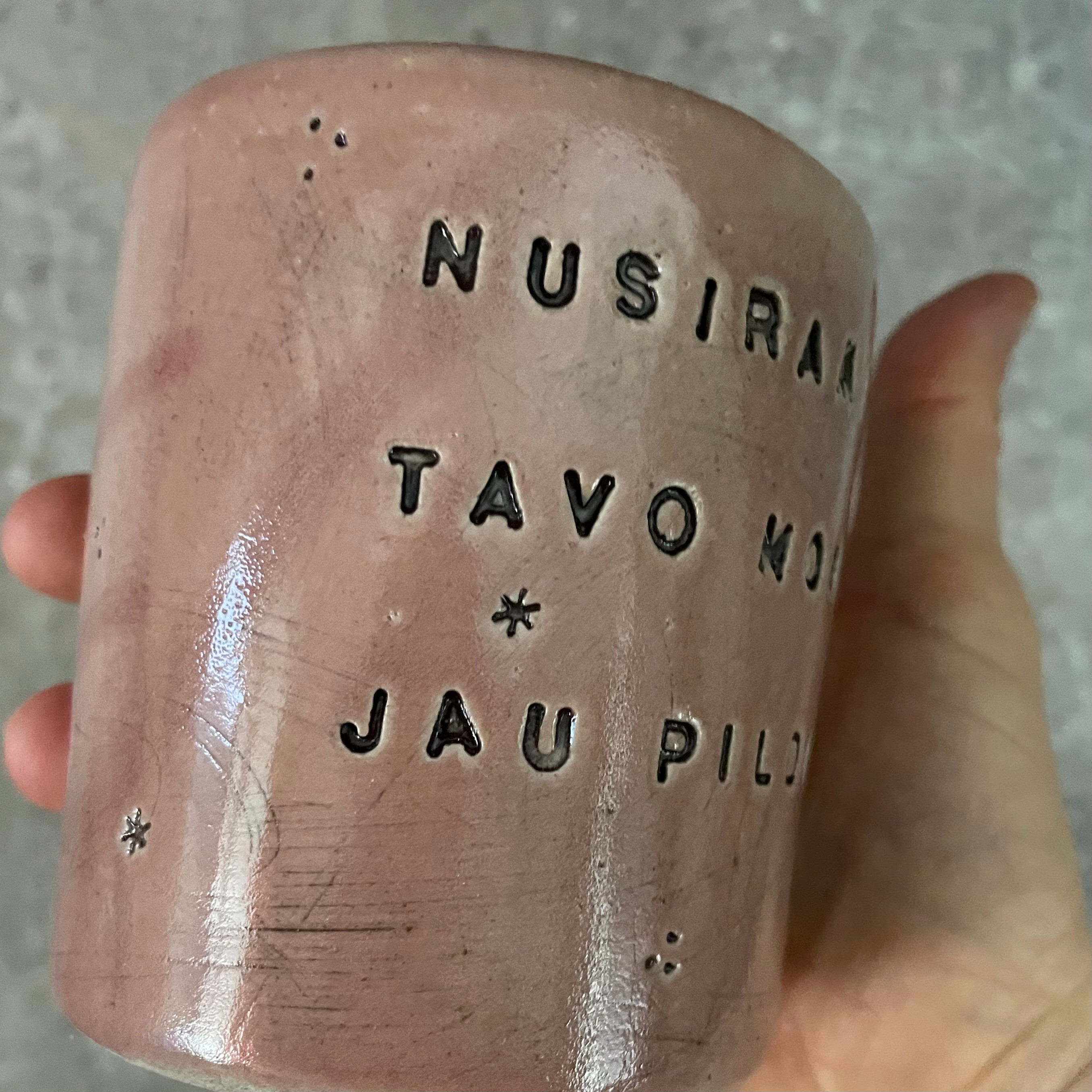 Pink mug with calming words without handle