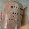 Pink mug with calming words without handle