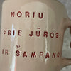 Pink big mug with saying in Lithuanian