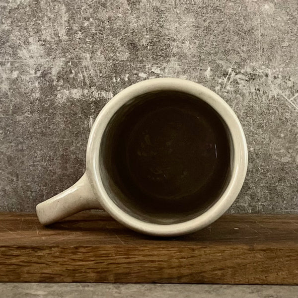 White big ceramic mug with words about work