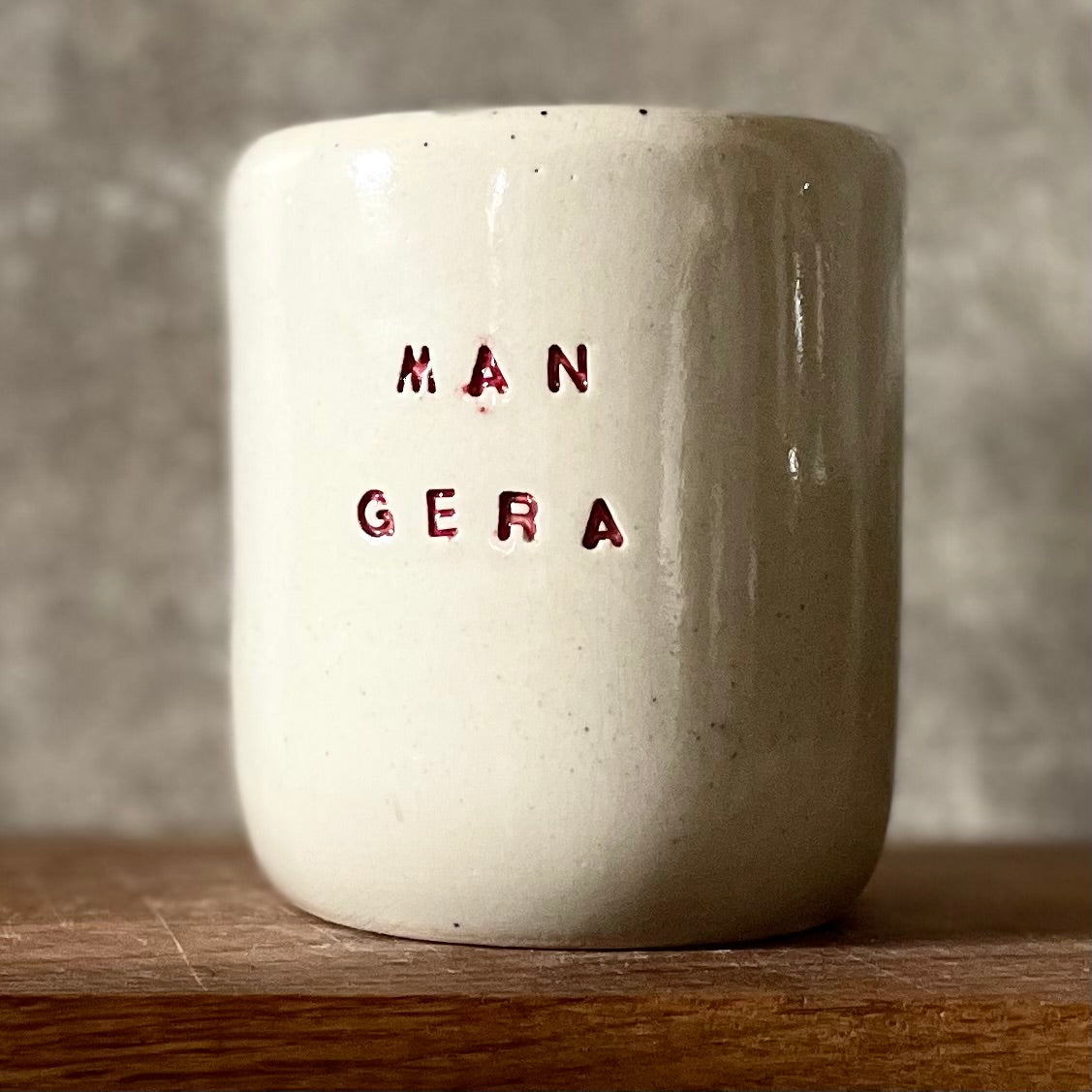 Cozy tumbler mug with words MAN GERA