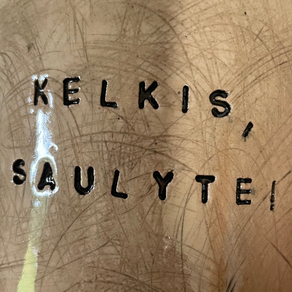 Big beige mug with saying in Lithuanian