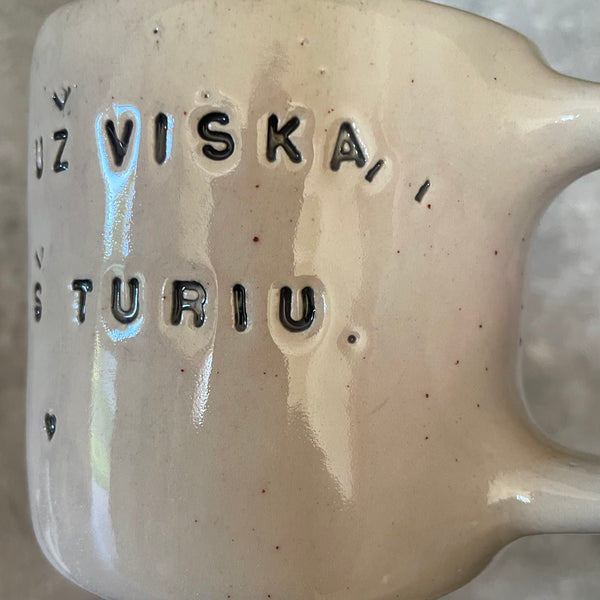 Pale mug with words of gratitude