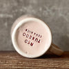 Pale pink mug with prosecco saying