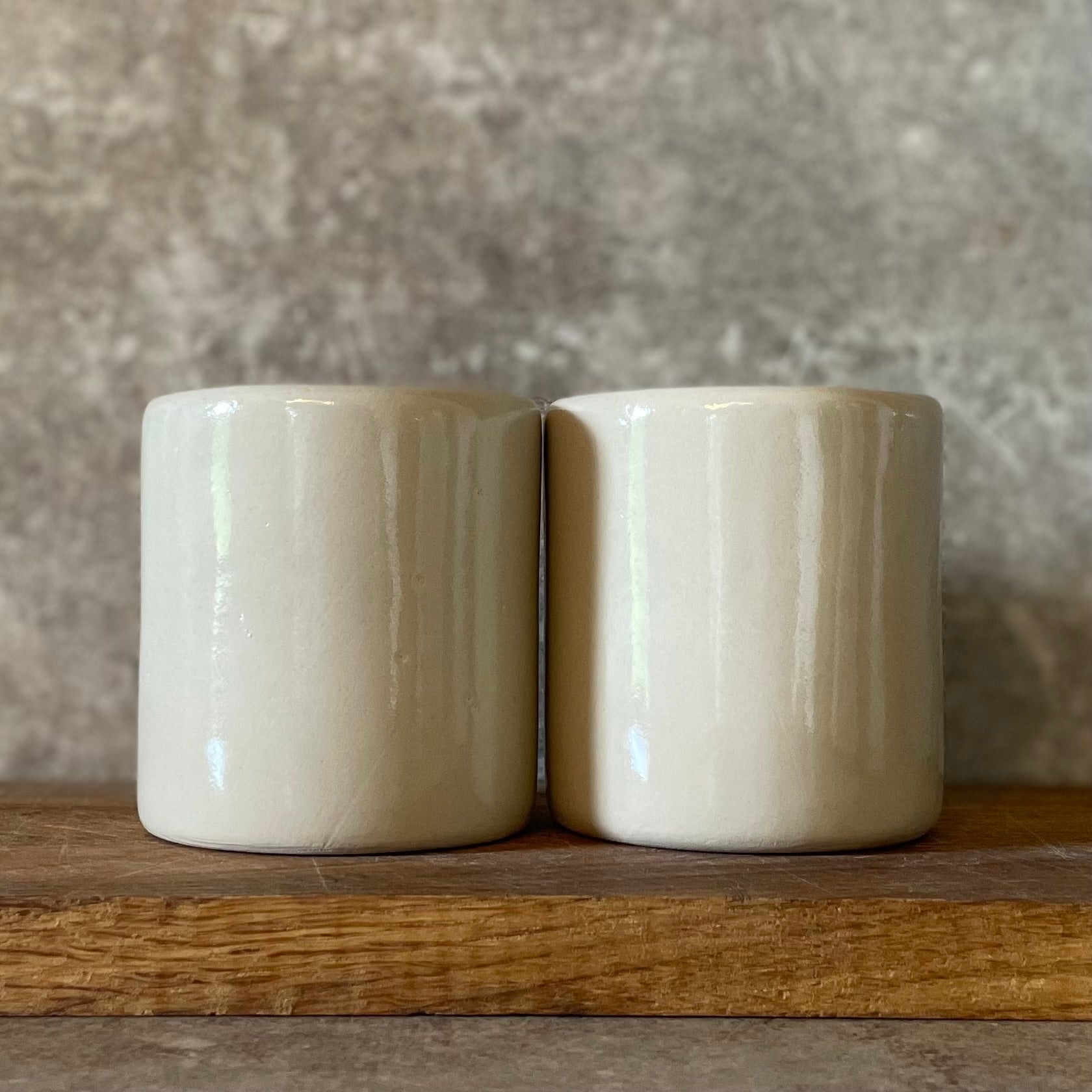 Two small bad mood mugs