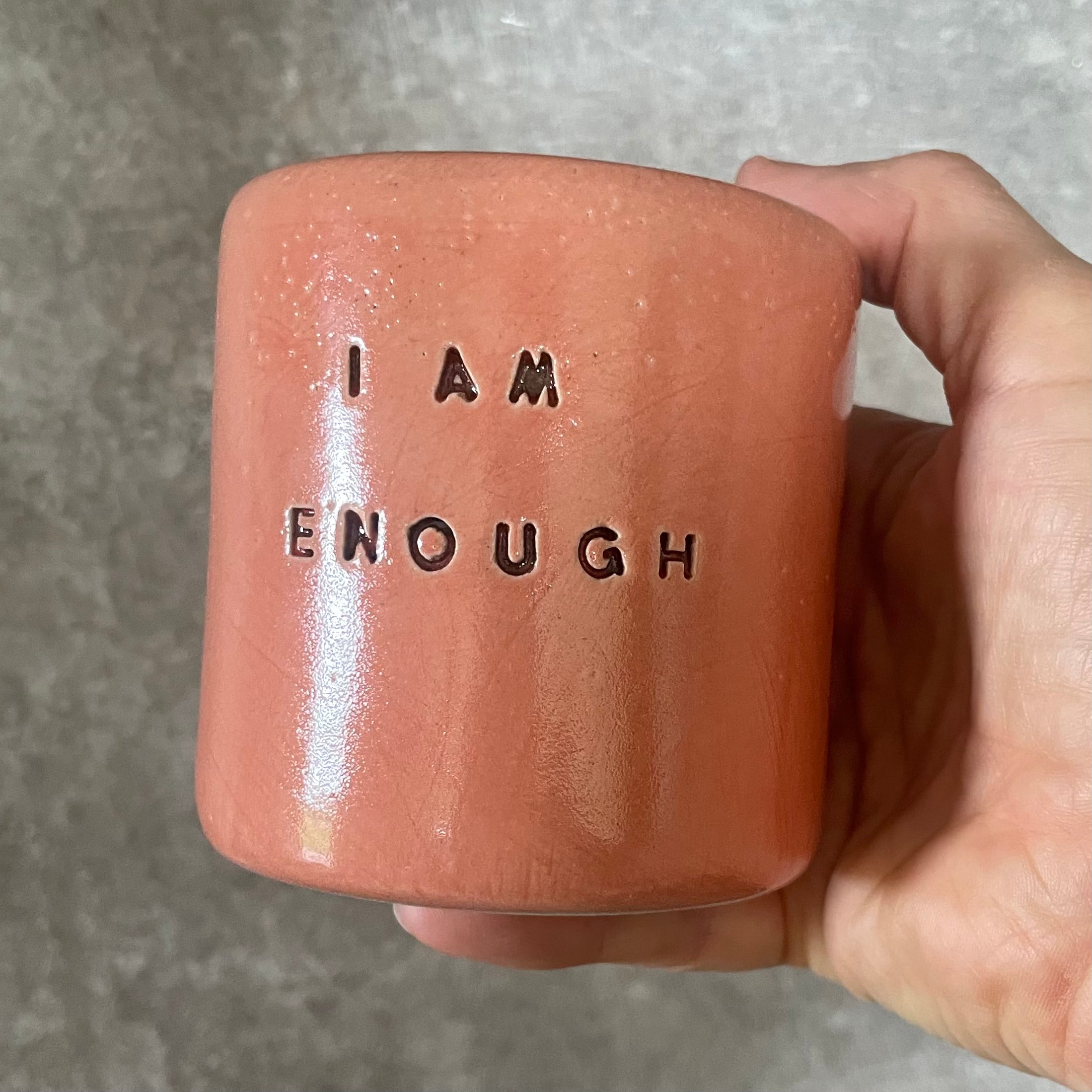 Pink ceramic tumbler mug with words I AM ENOUGH