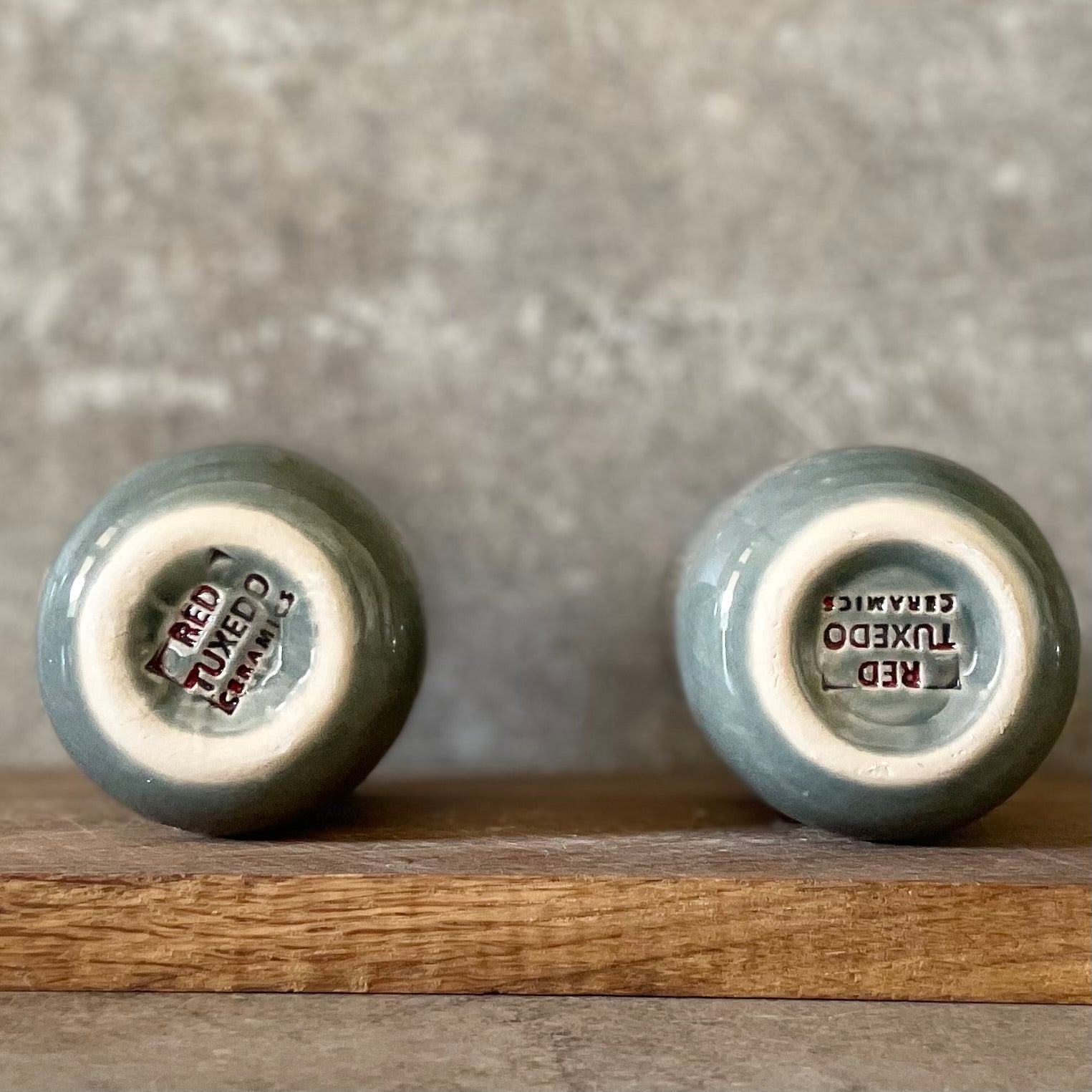 Set of small grayish mugs
