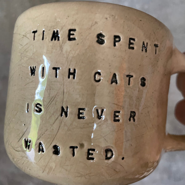 Mug with quote about cats
