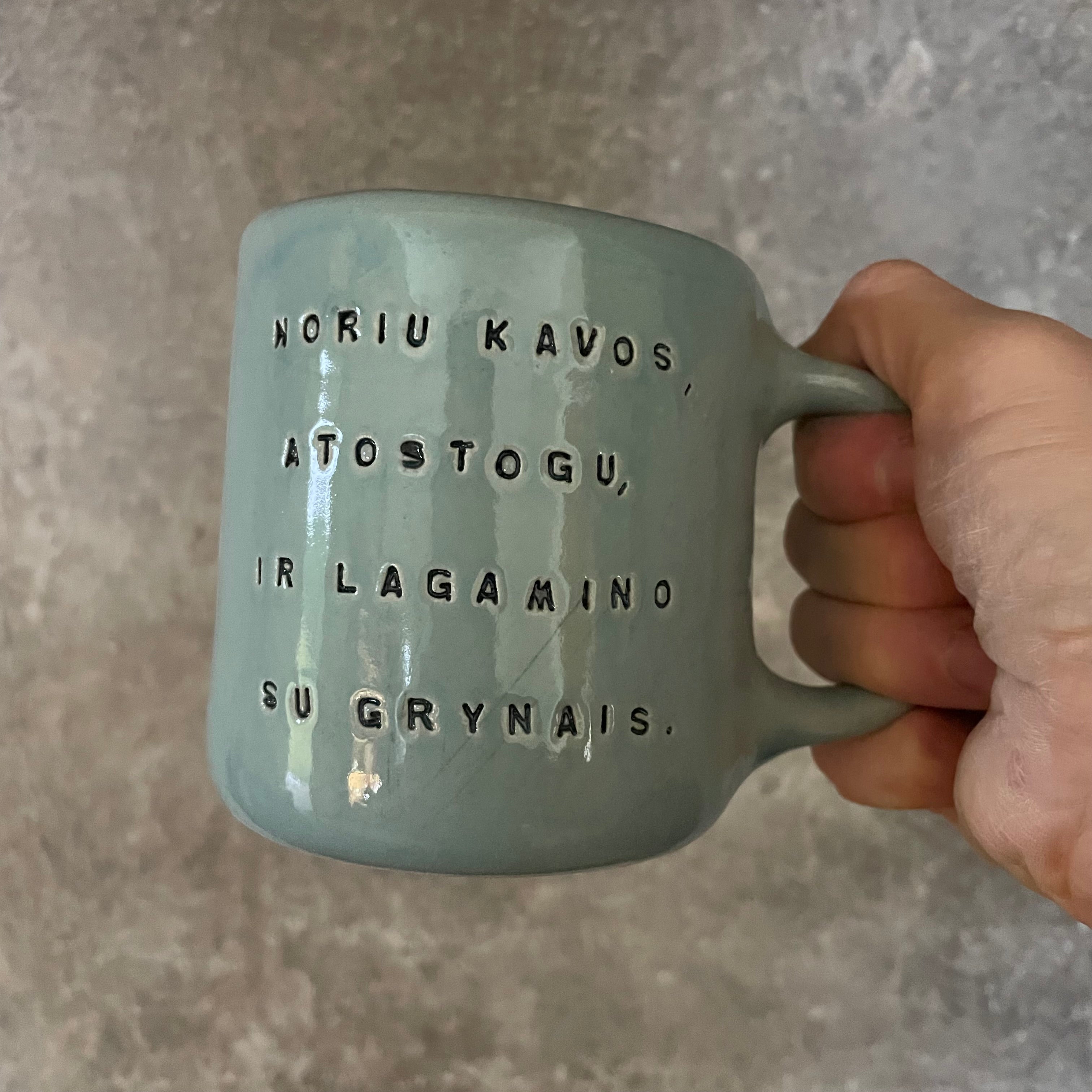 Blue mug with funny phrase in Lithuanian