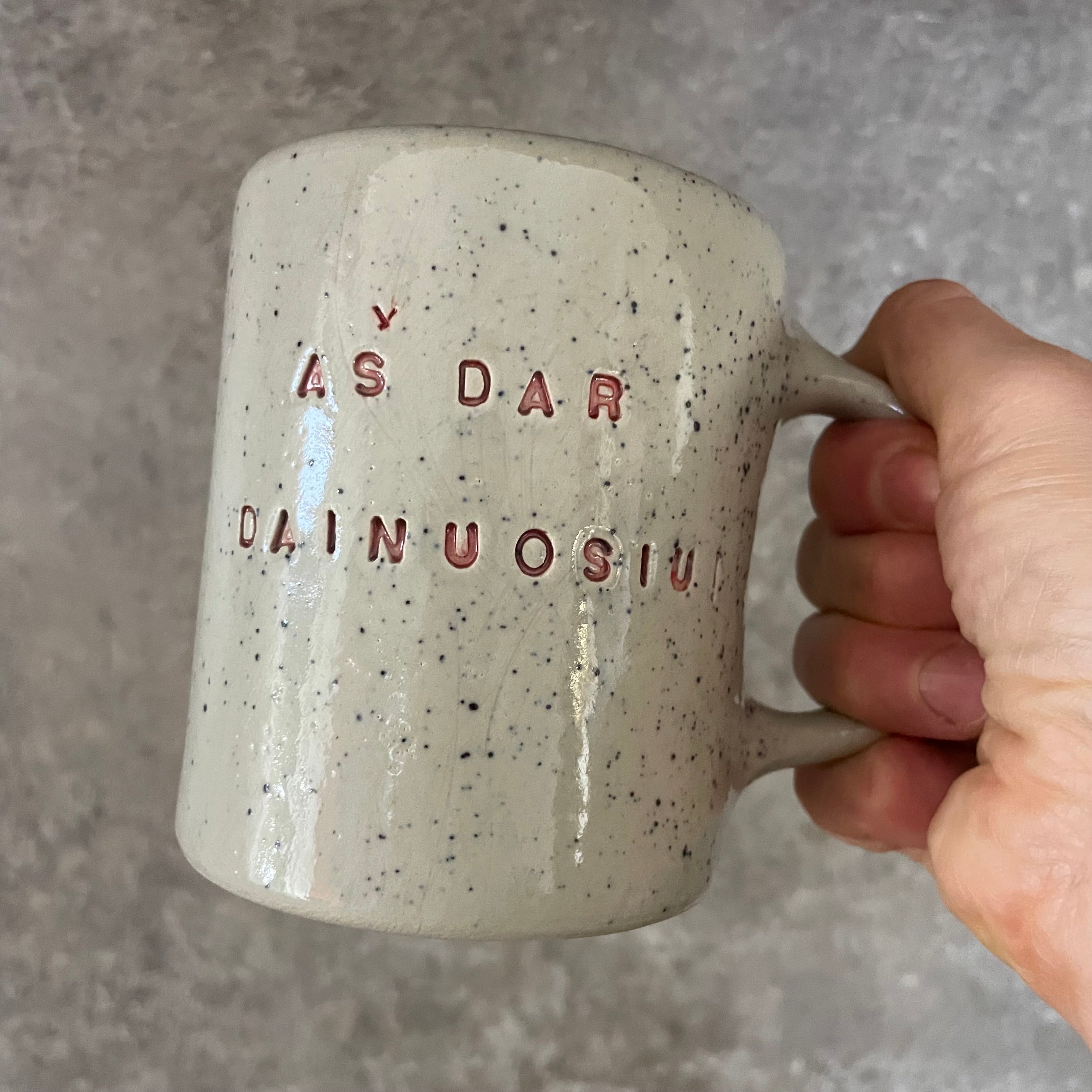 Dainuojančių puodelis