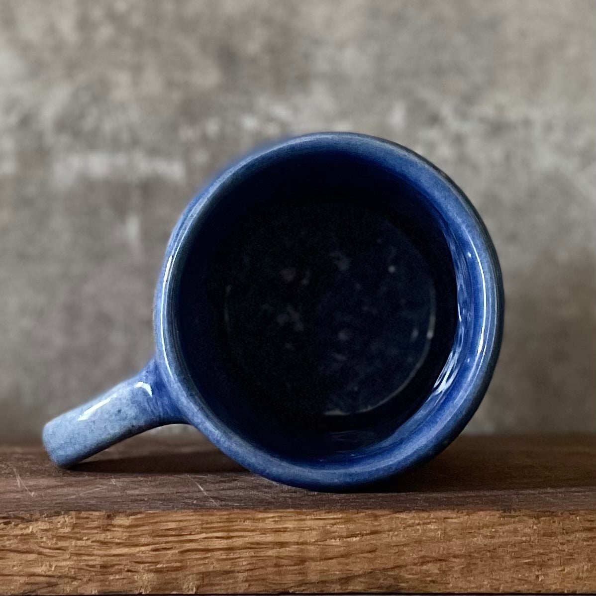 Blue ceramic mug about luck