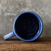 Blue ceramic mug about luck