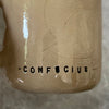 Beige mug with quote by Confucius