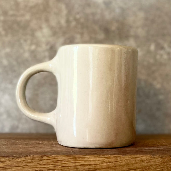 Smaller mug with funny phrase in Lithuanian