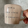 Pale pink mug with prosecco saying