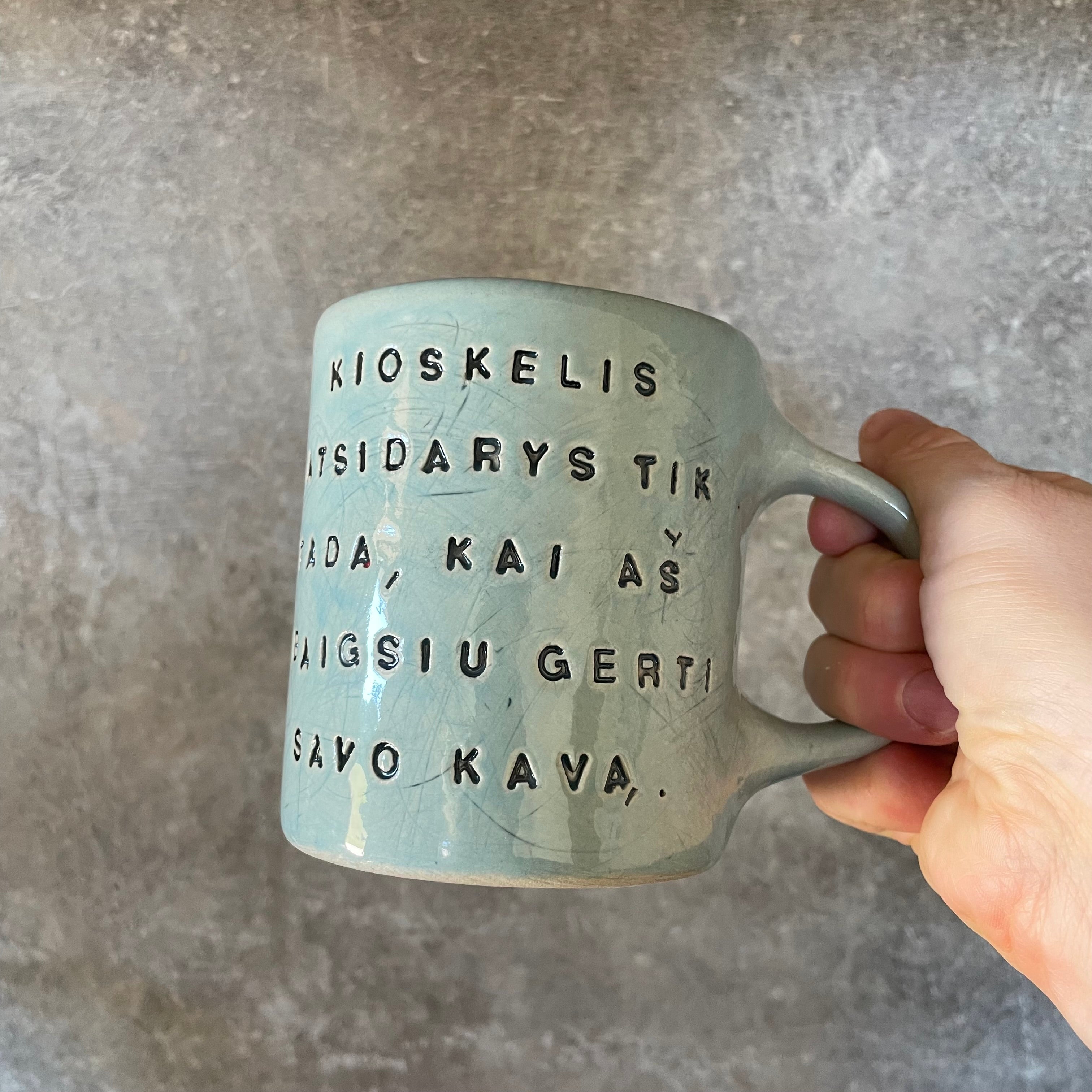 Blue mug with funny phrase in Lithuanian