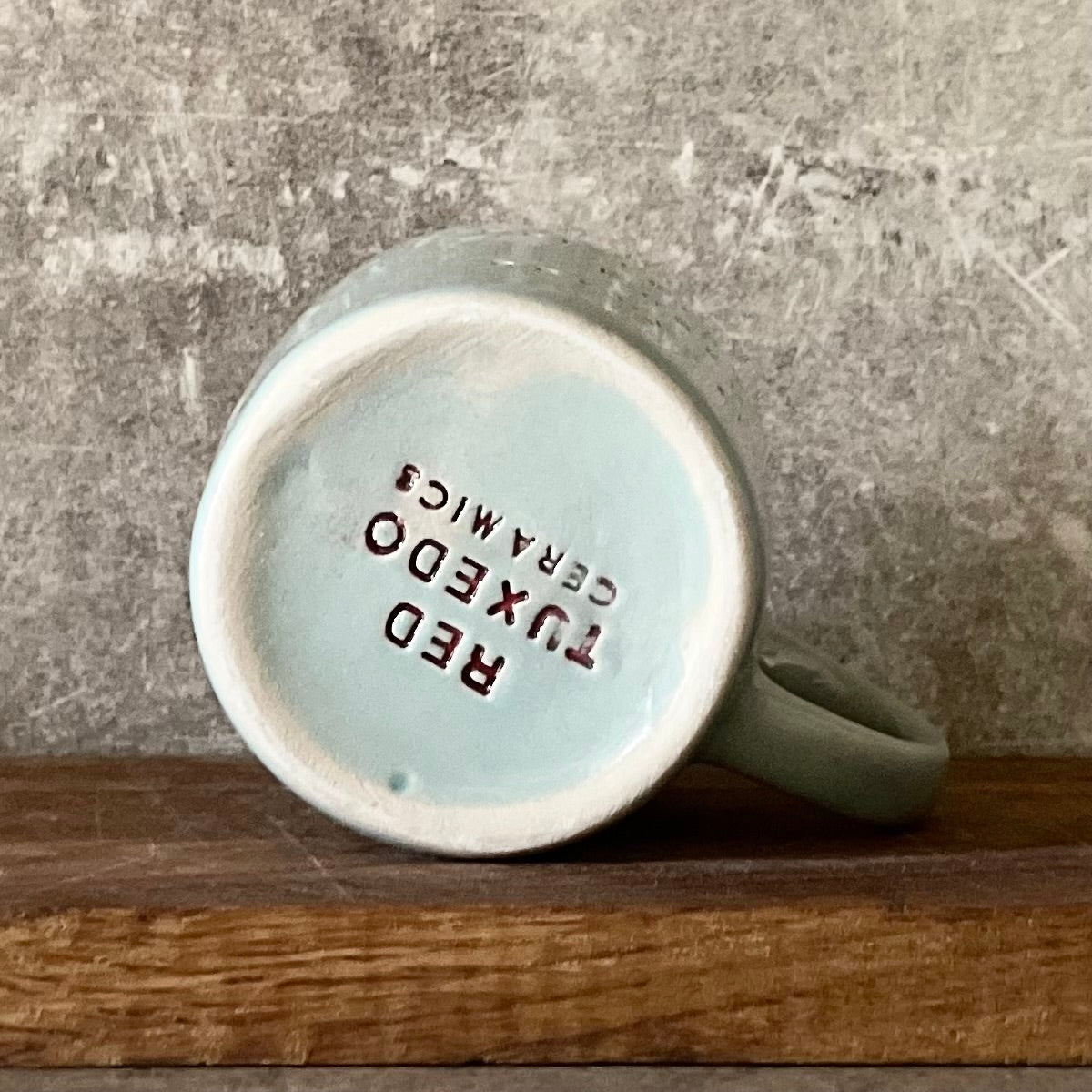 Blue mug with saying in Lithuanian