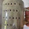 Green ceramic mug with words about work