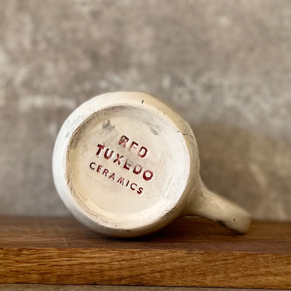 White big ceramic mug with words about work