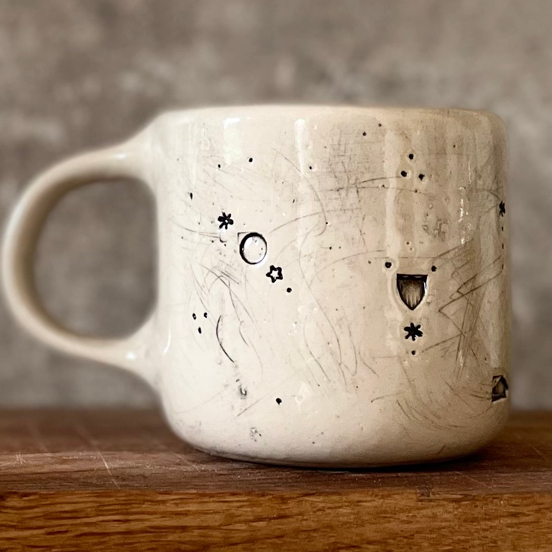Ceramic mug with saying about magic