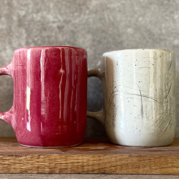A pair of big ceramic mugs for work and fun