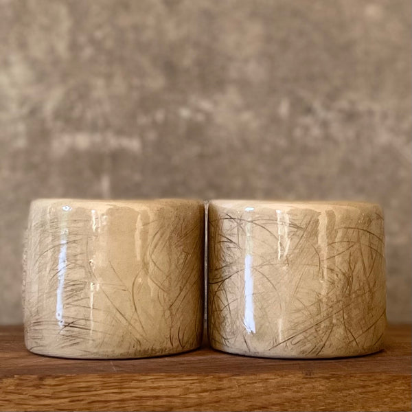 Set of two espresso mugs with words in Lithuanian