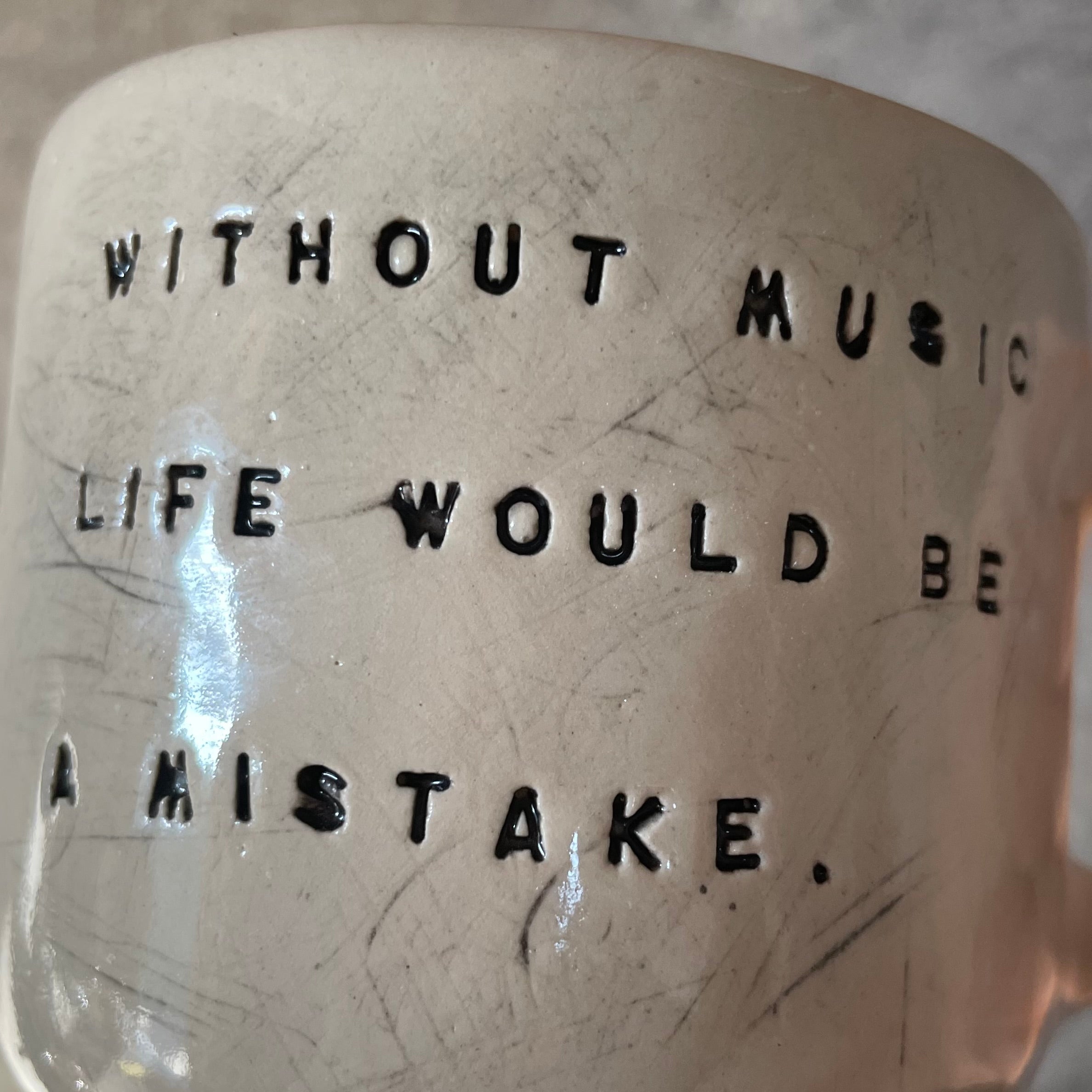Mug with quote about music