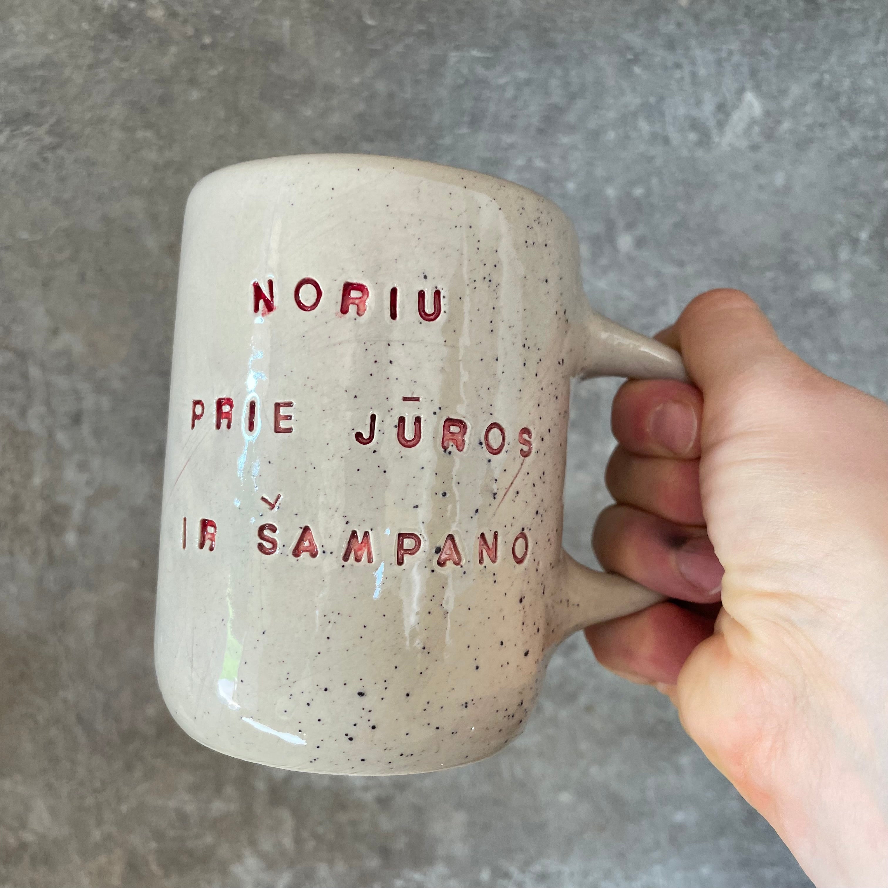 A pair of speckled ceramic mugs for a princess