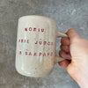 A pair of speckled ceramic mugs for a princess