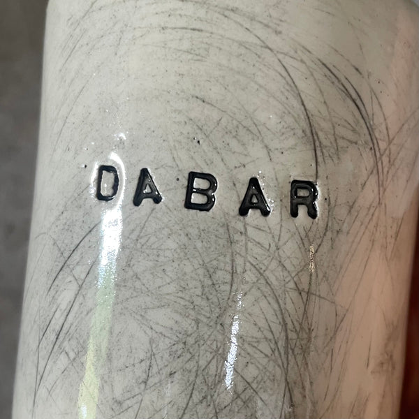 Off-white coffee mugs with words DABAR LĖČIAU