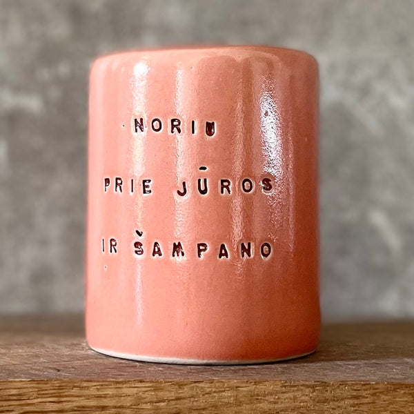 Red mug about champagne