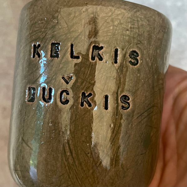 Dark green mug KELKIS BUČKIS