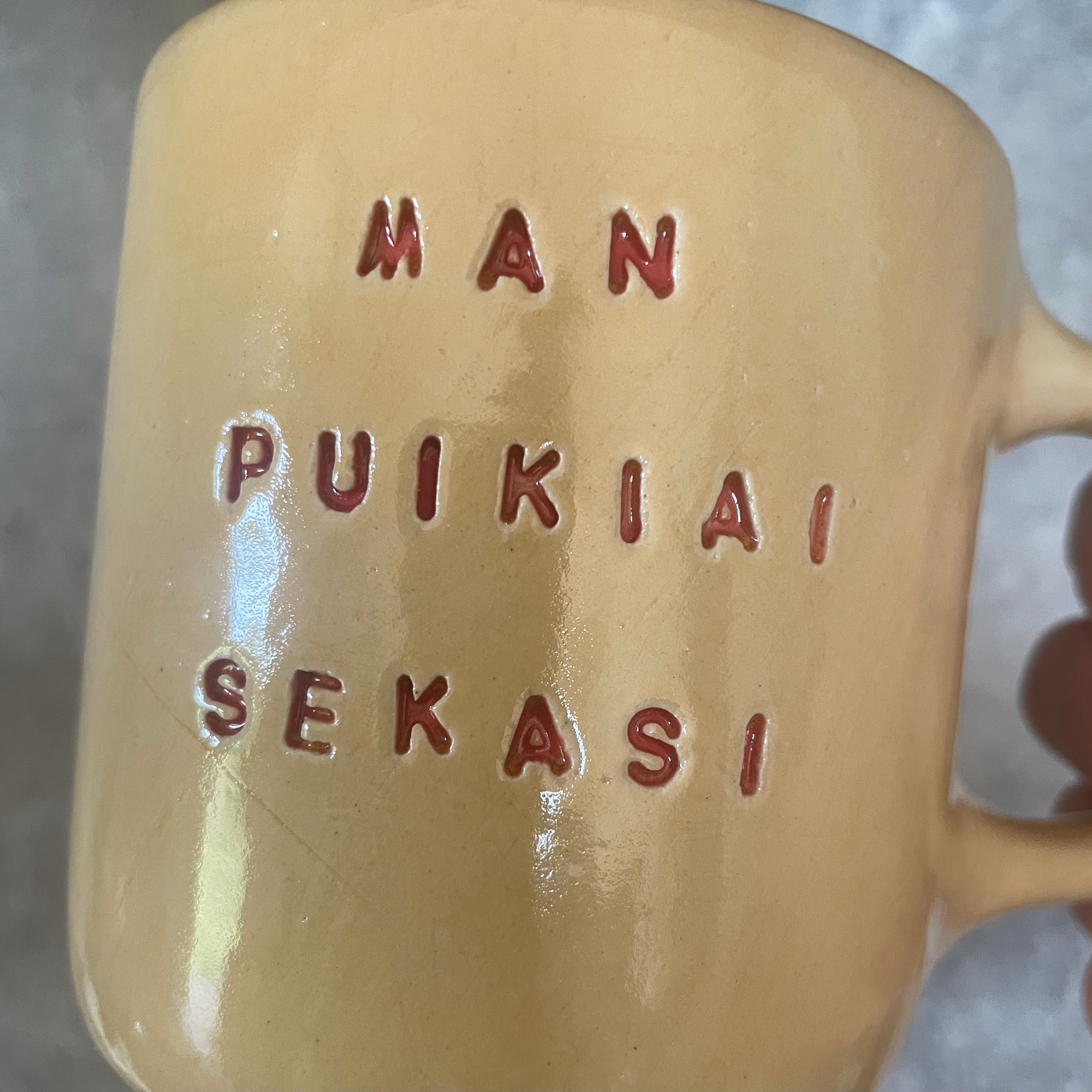 Yellow ceramic mug about luck