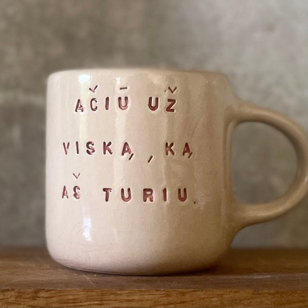 Rožinis dėkingumo puodelis