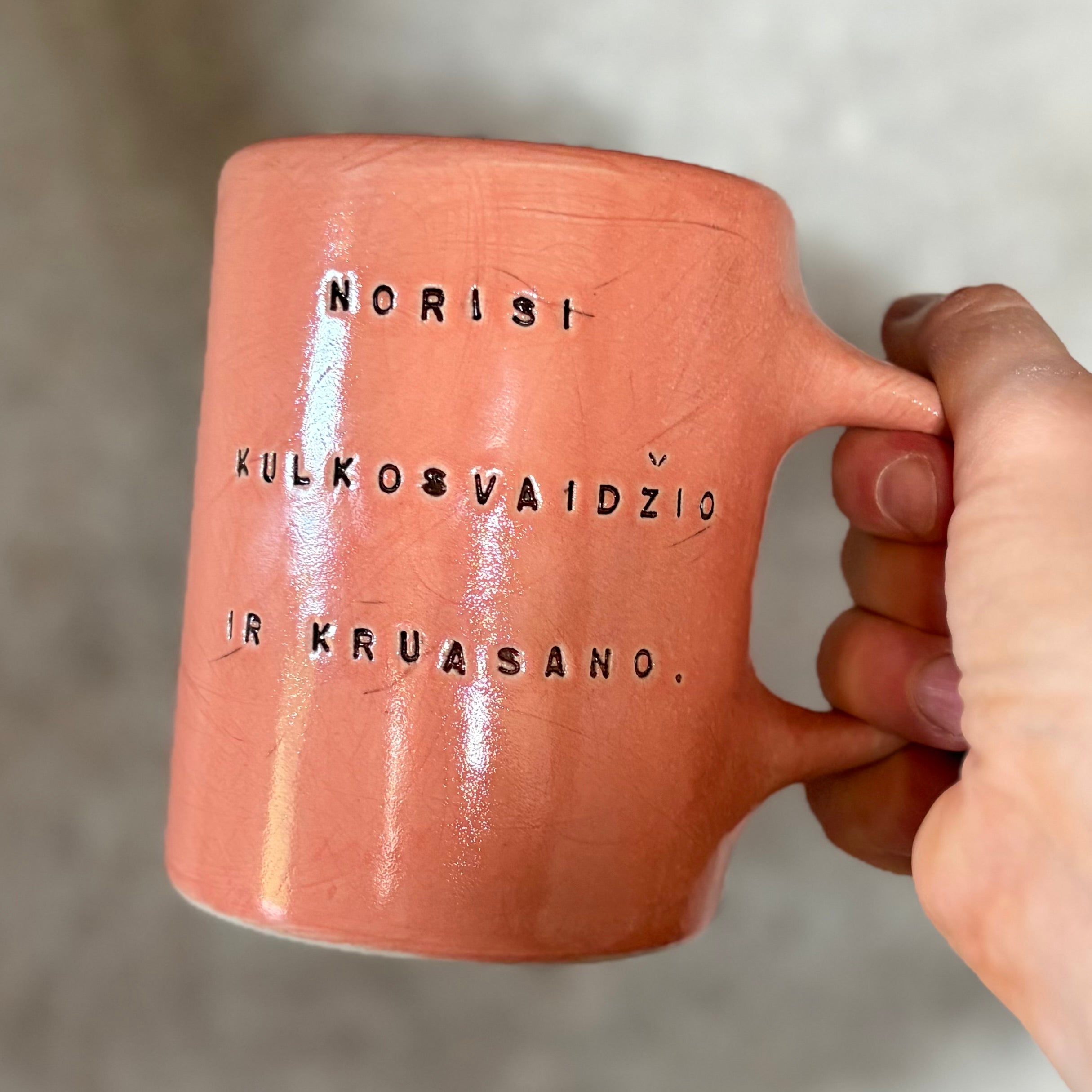 Pink mug with funny phrase in Lithuanian