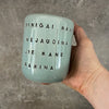 Ceramic mug about money