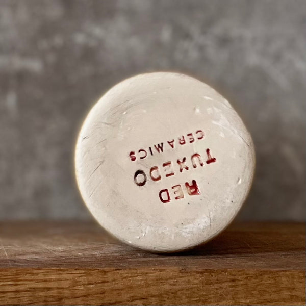 Yellow mug with saying in Spanish