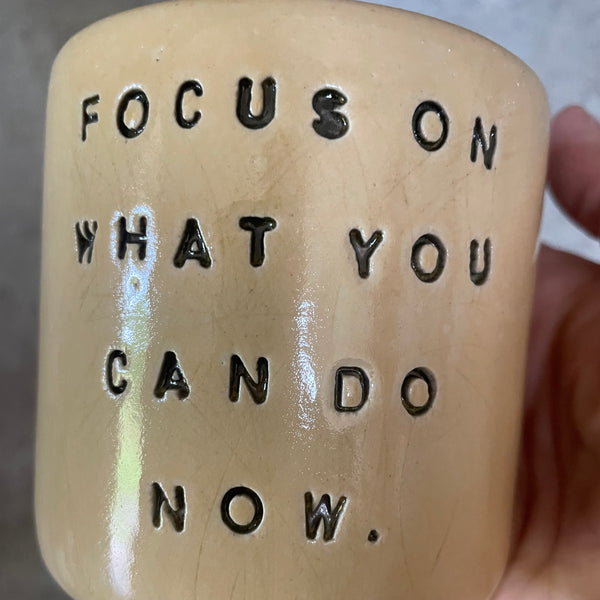 Bright yellow tumbler for motivation