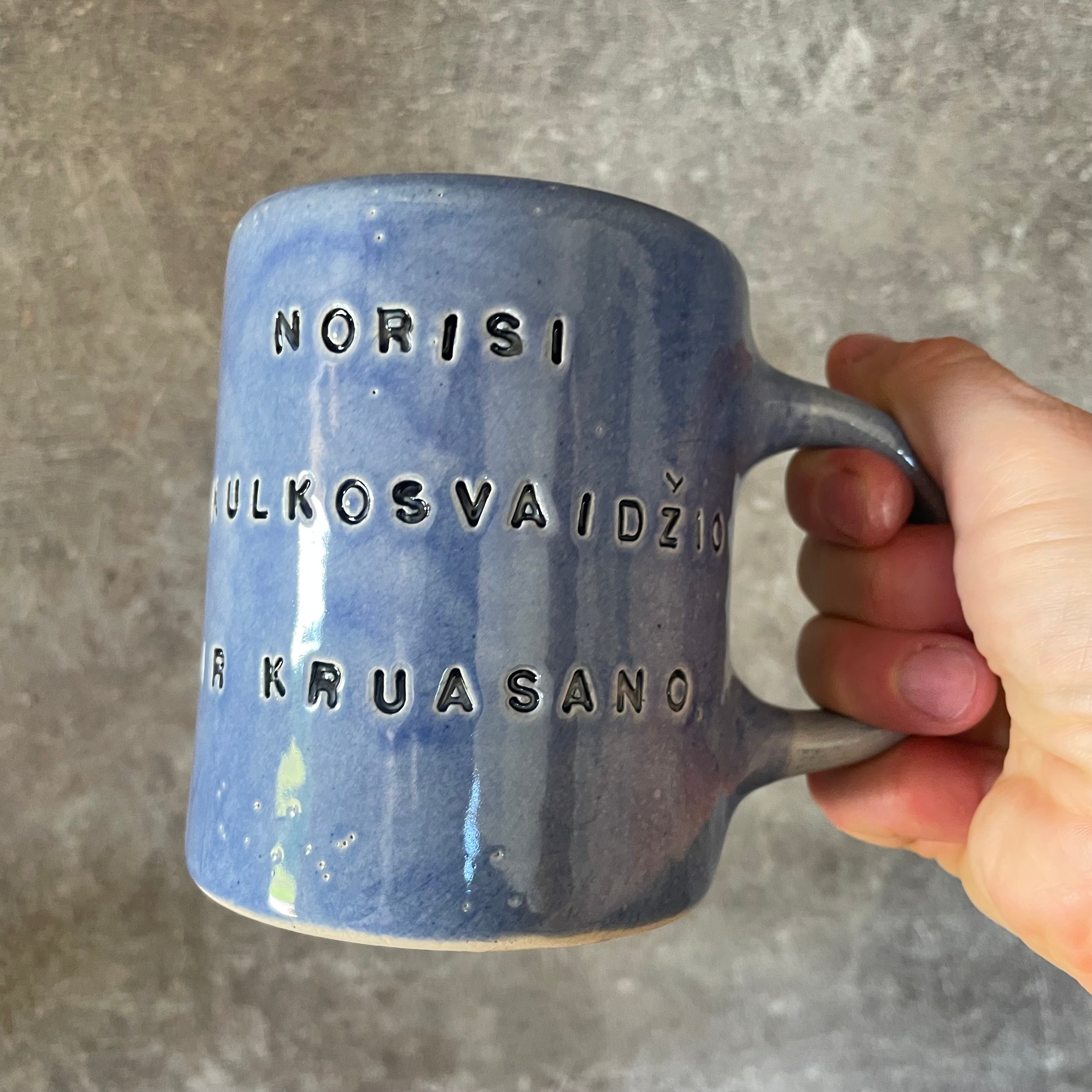 Blue mug with funny phrase in Lithuanian